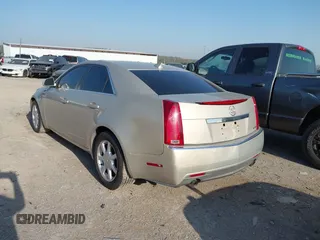 2009 Cadillac CTS RWD w/1SA with VIN 1G6DF577990141214, listed as a IAAI auction lot 42014205 with 237,986 mi miles. Bid and sale history available at carsss.com. Image 3.