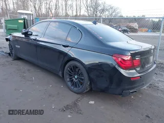 2015 BMW 7 Series 740Li xDrive with VIN WBAYF4C51FGS99074, listed as a IAAI auction lot 41222498 with 132,789 mi miles. Bid and sale history available at carsss.com. Image 3.