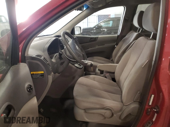 2009 Kia Sedona LX with VIN KNDMB233096314111, listed as a Copart auction lot 75015294 with 119,756 mi miles and Salvage Title. Bid and sale history available at carsss.com. Image 7.