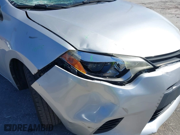 2014 Toyota Corolla L with VIN 2T1BURHE5EC006925, listed as a IAAI auction lot 40917569 with 130,761 mi miles and . Bid and sale history available at DreamBid. Image 6.