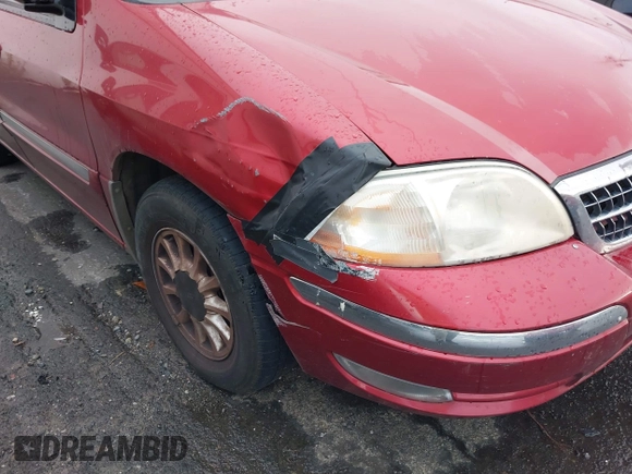 1999 Ford Windstar SE with VIN 2FMZA5244XBA09421, listed as a IAAI auction lot 41973187 with 217,545 mi miles and . Bid and sale history available at DreamBid. Image 12.