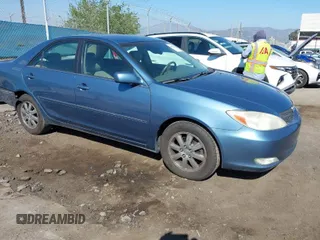 2004 Toyota Camry LE with VIN 4T1BF32K84U576050, listed as a IAAI auction lot 41993841 with 101,702 mi miles. Bid and sale history available at carsss.com. Image 1.