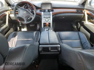 2005 Acura RL z VIN JH4KB165X5C004380, wystawiony jako Copart lot #54139035 z przebiegiem 144 934 mil mil oraz Szkoda całkowita • Salvage title. Historia ofert i sprzedaży dostępna na DreamBid. Obrazek 8.
