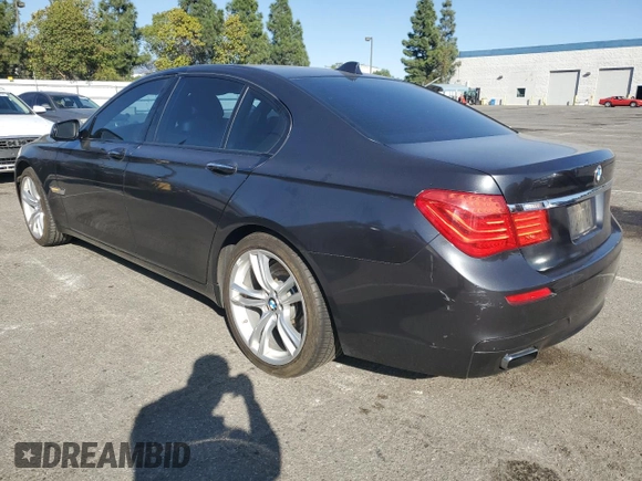 2011 BMW 7 Series 750i with VIN WBAKA8C58BCY37296, listed as a Copart auction lot 80540904 with 158,632 mi miles and Clean title. Bid and sale history available at DreamBid. Image 2.