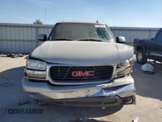 2005 GMC Yukon SLE with VIN 1GKEC13T95J221417, listed as a Copart auction lot 77009394 with 308,033 mi miles and Salvage Title. Bid and sale history available at carsss.com. Image 5.