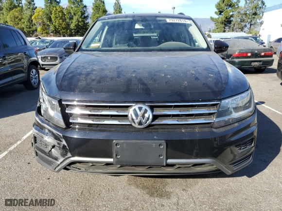 2020 Volkswagen Tiguan SE with VIN 3VV3B7AX2LM105721, listed as a Copart auction lot 79272814 with 59,887 mi miles and Salvage Title. Bid and sale history available at carsss.com. Image 5.