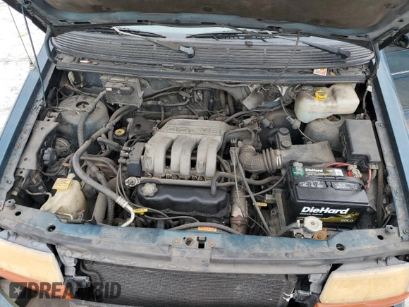 1995 Dodge Caravan Grand SE z VIN 1B4GH44R8SX633988, wystawiony jako Copart lot #65667454 z przebiegiem 121 183 mil mil oraz Czysty tytuł • Clean title. Historia ofert i sprzedaży dostępna na DreamBid. Obrazek 12.