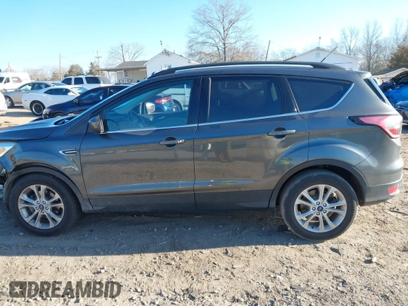 2018 Ford Escape SE with VIN 1FMCU0GD0JUA87303, listed as a IAAI auction lot 41612502 with 70,233 mi miles. Bid and sale history available at carsss.com. Image 15.