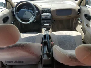 1999 Saturn SL with VIN 1G8ZK5271XZ226783, listed as a Copart auction lot 56467315 with 86,168 mi miles and Salvage title. Bid and sale history available at DreamBid. Image 8.