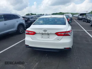 2019 Toyota Camry LE with VIN 4T1B11HK2KU743445, listed as a IAAI auction lot 42129688 with 284,938 mi miles and . Bid and sale history available at DreamBid. Image 16.