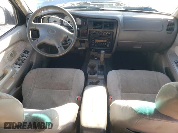 2003 Toyota Tacoma PreRunner z VIN 5TEGM92N33Z215411, wystawiony jako Copart lot #49573225 z przebiegiem 255 517 mil mil oraz Czysty tytuł • Clean title. Historia ofert i sprzedaży dostępna na DreamBid. Obrazek 8.