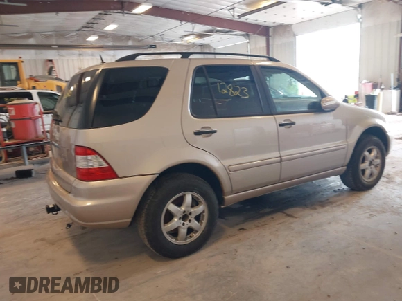 2005 Mercedes-Benz M 500 with VIN 4JGAB75E05A525942, listed as a IAAI auction lot 42012823 with 176,682 mi miles and . Bid and sale history available at DreamBid. Image 4.