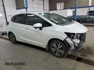 2016 Honda Fit EX with VIN JHMGK5H74GX046356, listed as a Copart auction lot 50905275 with 121,707 mi miles and Salvage title. Bid and sale history available at DreamBid. Image 4.