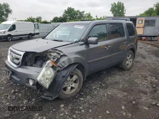 2011 Honda Pilot EX-L z VIN 5FNYF4H52BB069897, wystawiony jako Copart lot #59101815 z przebiegiem 182 765 mil mil oraz Nie do naprawy • Non repairable. Historia ofert i sprzedaży dostępna na DreamBid. Obrazek 1.