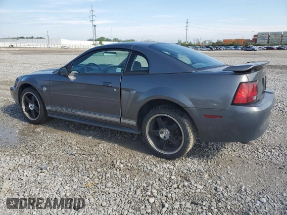 2004 Ford Mustang Standard with VIN 1FAFP40674F229138, listed as a Copart auction lot 56186445 with 128,566 mi miles and Salvage title. Bid and sale history available at DreamBid. Image 2.