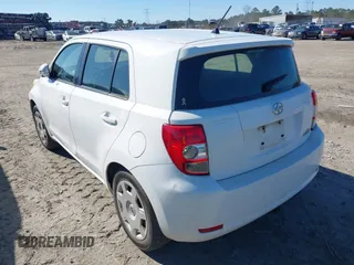 2009 Scion xD with VIN JTKKU10499J033651, listed as a IAAI auction lot 41350000 with 292,848 mi miles and . Bid and sale history available at DreamBid. Image 3.