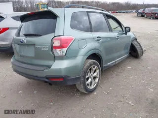 2017 Subaru Forester Touring with VIN JF2SJATC1HH517582, listed as a IAAI auction lot 41710840 with 81,920 mi miles. Bid and sale history available at carsss.com. Image 4.
