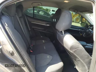2024 Toyota Camry LE z VIN 4T1R11AK2RU216038, wystawiony jako Copart lot #56582725 z przebiegiem 42 623 mil mil oraz Szkoda całkowita • Salvage title. Historia ofert i sprzedaży dostępna na DreamBid. Obrazek 10.