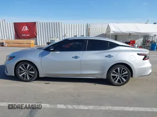 2021 Nissan Maxima SV with VIN 1N4AA6CV0MC505297, listed as a IAAI auction lot 41920090 with 70,100 mi miles and . Bid and sale history available at DreamBid. Image 14.
