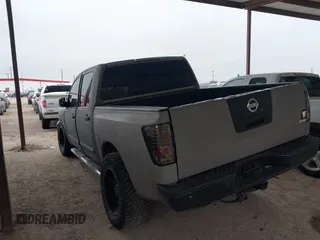 2008 Nissan Titan XE with VIN 1N6BA07DX8N339911, listed as a IAAI auction lot 41539937 with 242,659 mi miles. Bid and sale history available at carsss.com. Image 3.