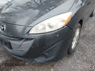 2014 Mazda 5 Sport with VIN JM1CW2BL7E0171690, listed as a IAAI auction lot 42048668 with 196,775 mi miles and . Bid and sale history available at carsss.com. Image 6.