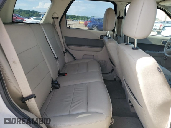 2012 Ford Escape XLT z VIN 1FMCU9DG2CKB54288, wystawiony jako Copart lot #61569655 z przebiegiem 169 899 mil mil oraz Szkoda całkowita • Salvage title. Historia ofert i sprzedaży dostępna na DreamBid. Obrazek 11.