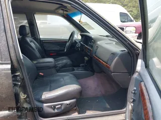 1996 Jeep Grand Cherokee Limited with VIN 1J4GZ78Y9TC351364, listed as a IAAI auction lot 42368001 with 254,634 mi miles and . Bid and sale history available at DreamBid. Image 5.