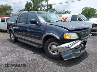 2001 Ford F-150 XLT z VIN 1FTRW07L21KC31753, wystawiony jako IAAI lot #42258913 z przebiegiem 205 960 mil mil oraz . Historia ofert i sprzedaży dostępna na DreamBid. Obrazek 1.