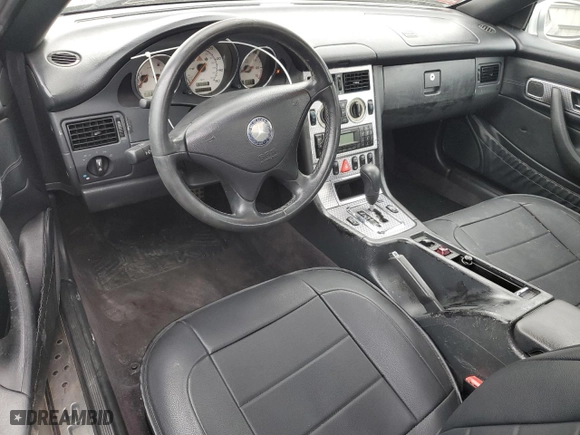2004 Mercedes-Benz SLK-Class with VIN WDBKK49F64F301438, listed as a Copart auction lot 77759904 with 113,583 mi miles and Salvage Title. Bid and sale history available at carsss.com. Image 8.