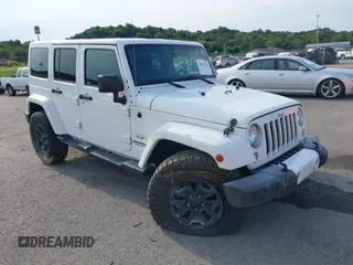 2016 Jeep Wrangler Unlimited Sahara z VIN 1C4HJWEG5GL172350, wystawiony jako IAAI lot #39987533 z przebiegiem 158 540 mil mil oraz . Historia ofert i sprzedaży dostępna na DreamBid. Obrazek 1.