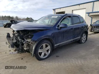 2014 Volkswagen Touareg с VIN WVGEG9BP4ED006217, выставлен на аукционе Copart как лот 71439174 с пробегом Не указан миль и На запчасти • Non repairable. История ставок и продаж доступна на DreamBid. Изображение 1.