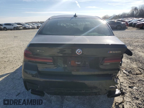 2023 BMW 5 Series M550i xDrive z VIN WBA13BK08PCM88687, wystawiony jako Copart lot #88633545 z przebiegiem Nie podano mil oraz Szkoda całkowita • Salvage title. Historia ofert i sprzedaży dostępna na DreamBid. Obrazek 6.