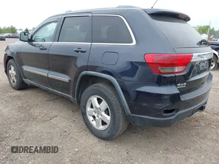 2011 Jeep Grand Cherokee Laredo with VIN 1J4RR4GG9BC608778, listed as a IAAI auction lot 42314313 with 151,780 mi miles and . Bid and sale history available at DreamBid. Image 3.