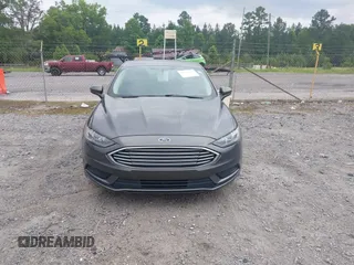 2017 Ford Fusion SE z VIN 3FA6P0HD6HR174945, wystawiony jako IAAI lot #42416548 z przebiegiem 128 410 mil mil oraz . Historia ofert i sprzedaży dostępna na DreamBid. Obrazek 12.