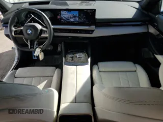 2024 BMW 5 Series 530i with VIN WBA43FJ06RCP67824, listed as a Copart auction lot 61351965 with 12,990 mi miles and Salvage title. Bid and sale history available at DreamBid. Image 8.