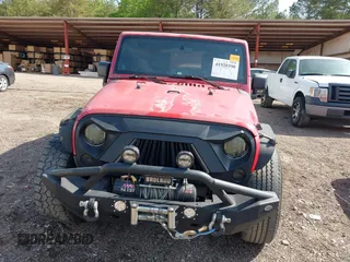 2007 Jeep Wrangler Unlimited X with VIN 1J4GB39197L150245, listed as a IAAI auction lot 41920390 with 239,532 mi miles and . Bid and sale history available at DreamBid. Image 6.