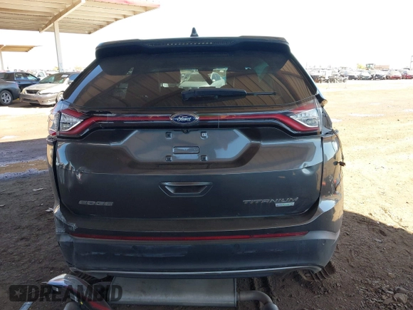 2015 Ford Edge Titanium z VIN 2FMTK3K90FBC12582, wystawiony jako IAAI lot #41860973 z przebiegiem Nie podano mil oraz . Historia ofert i sprzedaży dostępna na DreamBid. Obrazek 15.