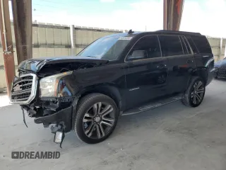 2016 GMC Yukon SLT with VIN 1GKS1BKC1GR363605, listed as a Copart auction lot 54324285 with 167,921 mi miles and Salvage Title. Bid and sale history available at carsss.com. Image 1.