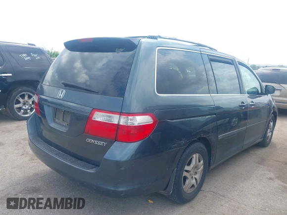 2006 Honda Odyssey LX with VIN 5FNRL38206B120381, listed as a IAAI auction lot 42058872 with 165,217 mi miles. Bid and sale history available at carsss.com. Image 4.