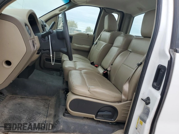 2007 Ford F-150 XL with VIN 1FTRF12W77NA84179, listed as a Copart auction lot 70638254 with 153,849 mi miles and Clean Title. Bid and sale history available at carsss.com. Image 7.