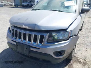 2016 Jeep Compass Sport with VIN 1C4NJCBB2GD577084, listed as a IAAI auction lot 42572348 with 164,234 mi miles and . Bid and sale history available at DreamBid. Image 6.