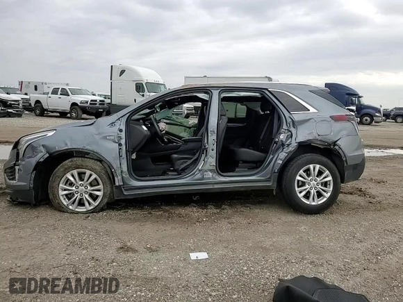 2021 Cadillac XT5 FWD Luxury with VIN 1GYKNAR44MZ192797, listed as a Copart auction lot 87304294 with 0 mi miles and Salvage Title. Bid and sale history available at carsss.com. Image 10.