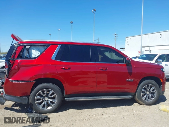 2021 Chevrolet Tahoe LT z VIN 1GNSCNKD1MR316397, wystawiony jako IAAI lot #41805199 z przebiegiem 41 028 mil mil oraz . Historia ofert i sprzedaży dostępna na DreamBid. Obrazek 13.