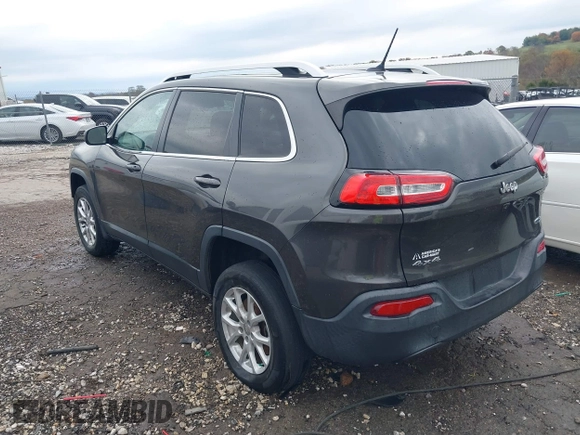 2014 Jeep Cherokee Altitude with VIN 1C4PJMCB7EW232678, listed as a IAAI auction lot 40812147 with 105,828 mi miles. Bid and sale history available at carsss.com. Image 3.