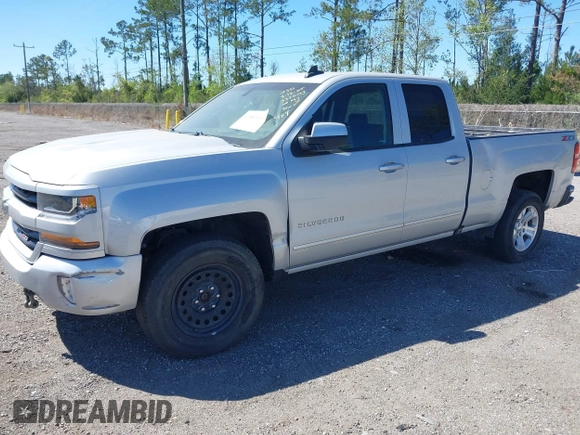 2018 Chevrolet Silverado 1500 LT with VIN 1GCVKREC9JZ335603, listed as a IAAI auction lot 41853399 with 152,460 mi miles and . Bid and sale history available at DreamBid. Image 17.
