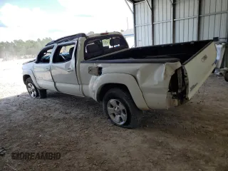 2005 Toyota Tacoma with VIN 3TMMU52N65M001833, listed as a Copart auction lot 62111395 with Not provided miles and Salvage title. Bid and sale history available at DreamBid. Image 2.