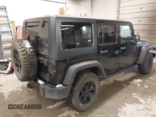 2016 Jeep Wrangler Unlimited Sport with VIN 1C4BJWDG9GL114359, listed as a IAAI auction lot 41422535 with 133,462 mi miles and . Bid and sale history available at DreamBid. Image 4.