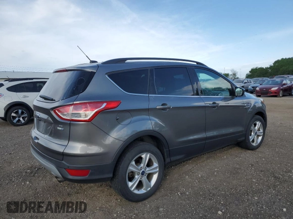 2014 Ford Escape SE z VIN 1FMCU9GX3EUE26446, wystawiony jako Copart lot #57113865 z przebiegiem 145 699 mil mil oraz Szkoda całkowita • Salvage title. Historia ofert i sprzedaży dostępna na DreamBid. Obrazek 3.