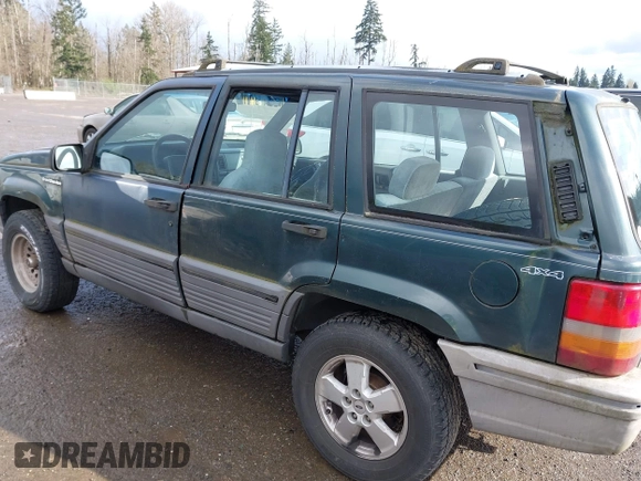 1995 Jeep Grand Cherokee Laredo with VIN 1J4GZ58SXSC676393, listed as a IAAI auction lot 41943464 with 244,317 mi miles. Bid and sale history available at carsss.com. Image 6.