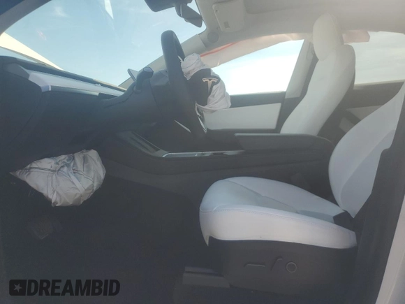 2022 Tesla Model Y Long Range with VIN 7SAYGAEE3NF416838, listed as a Copart auction lot 46157675 with 24,254 mi miles and Salvage Title. Bid and sale history available at DreamBid. Image 7.